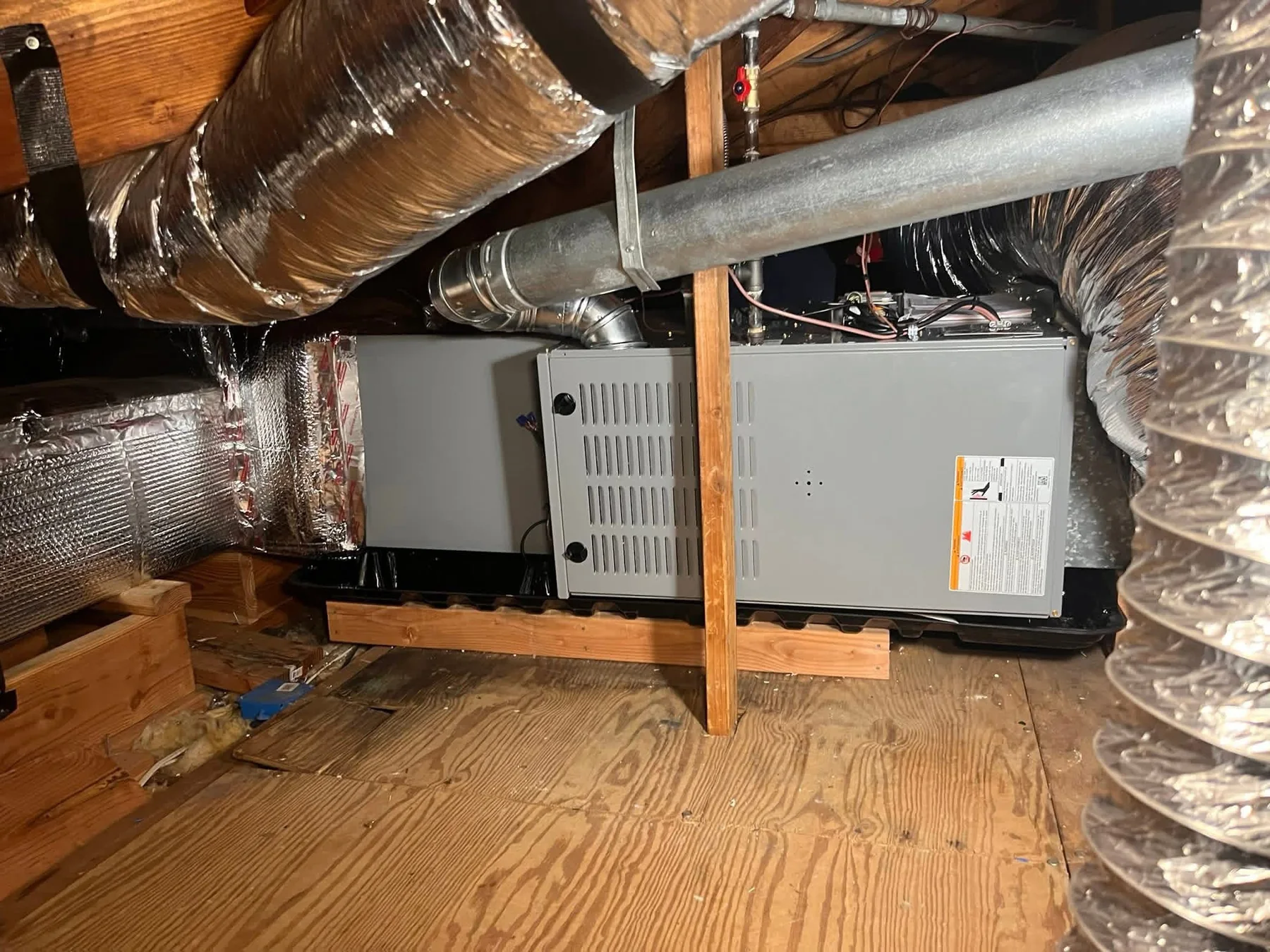 Attic HVAC system with ductwork and air distribution